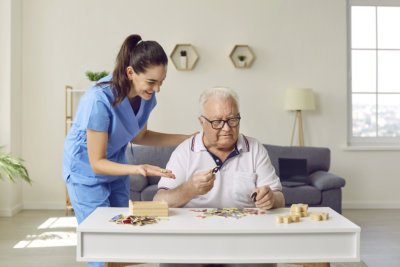 woman assisting the eldery man