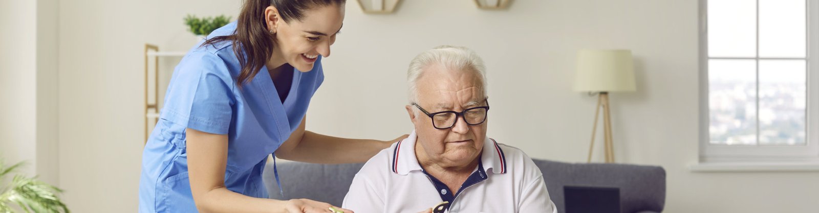 woman assisting the eldery man